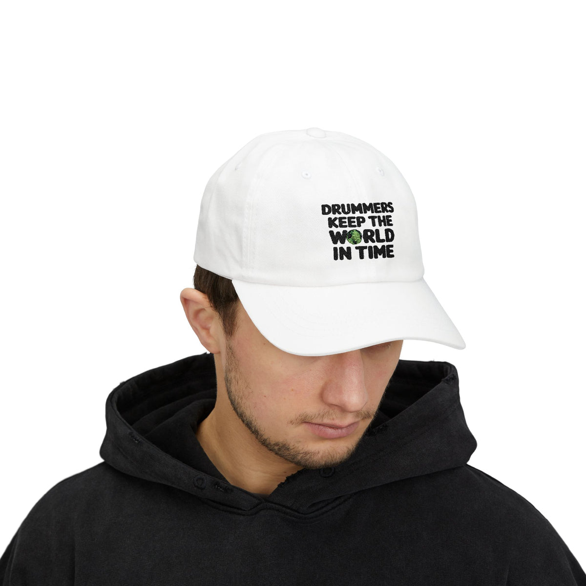 Model wearing a white cap with text 'Drummers Keep the World in Time'