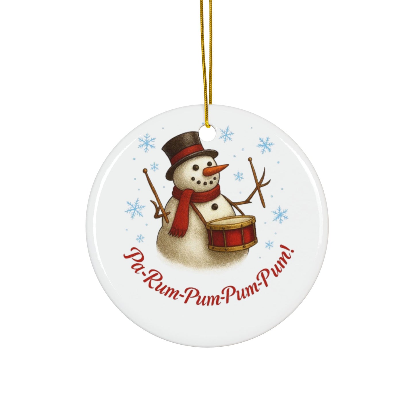 Round ceramic ornament with a snowman playing a drum and text 'Pu-Rum-Pum-Pum!' on a white background.
