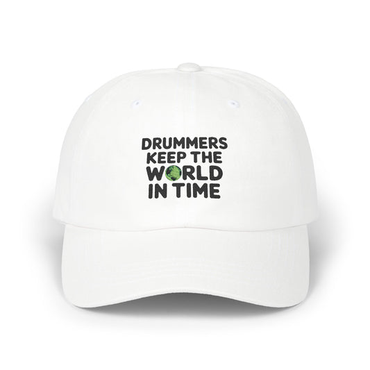 White baseball cap with the text 'Drummer keep the world in time' printed on the front.